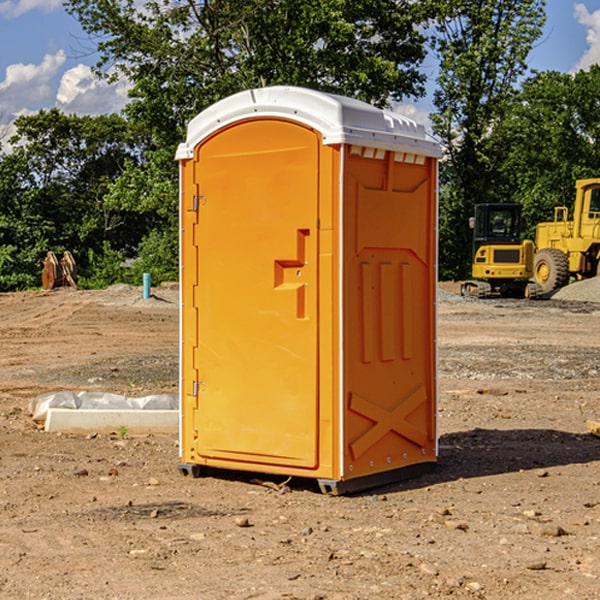 what is the cost difference between standard and deluxe portable restroom rentals in Impact